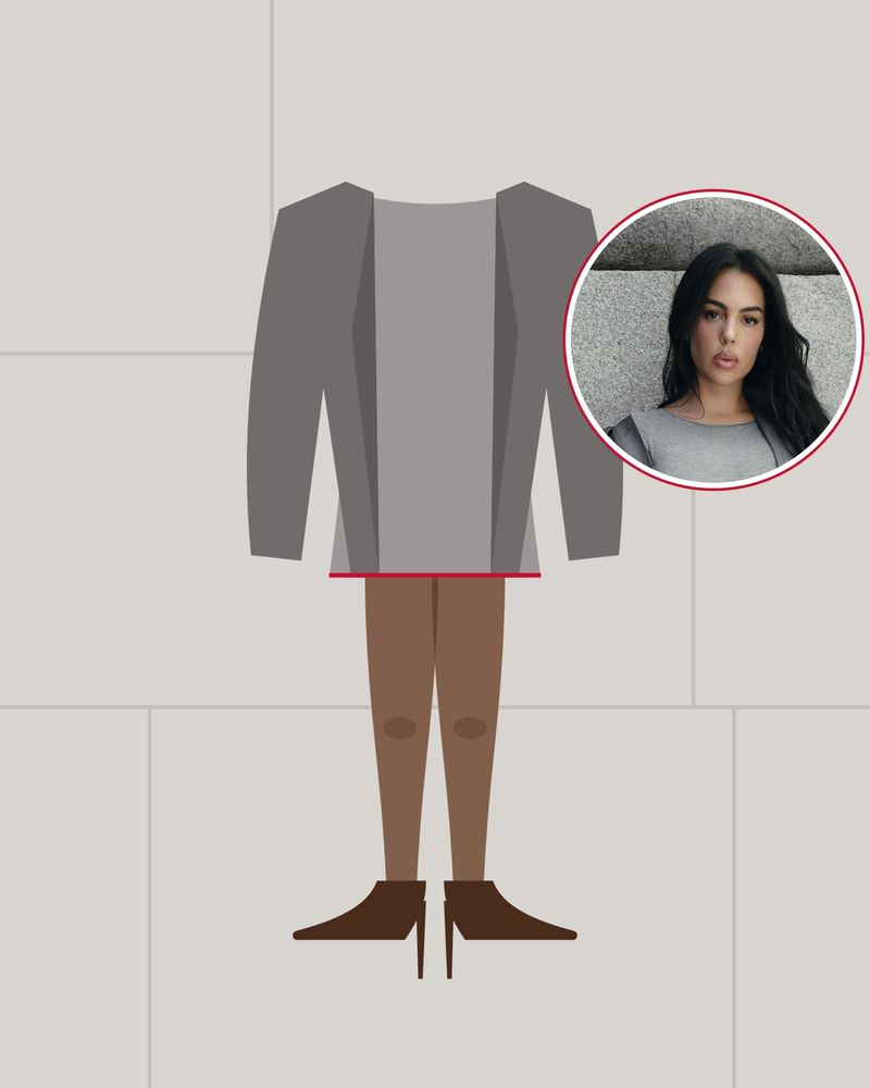 Illustration: legs in sheer brown tights and pointed brown pumps under a grey mini dress and a loose grey jacket, against a stone wall, with a photo of Georgina Rodríguez in the circle